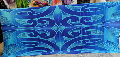 Blue patterned fabric with wave design on a plain background